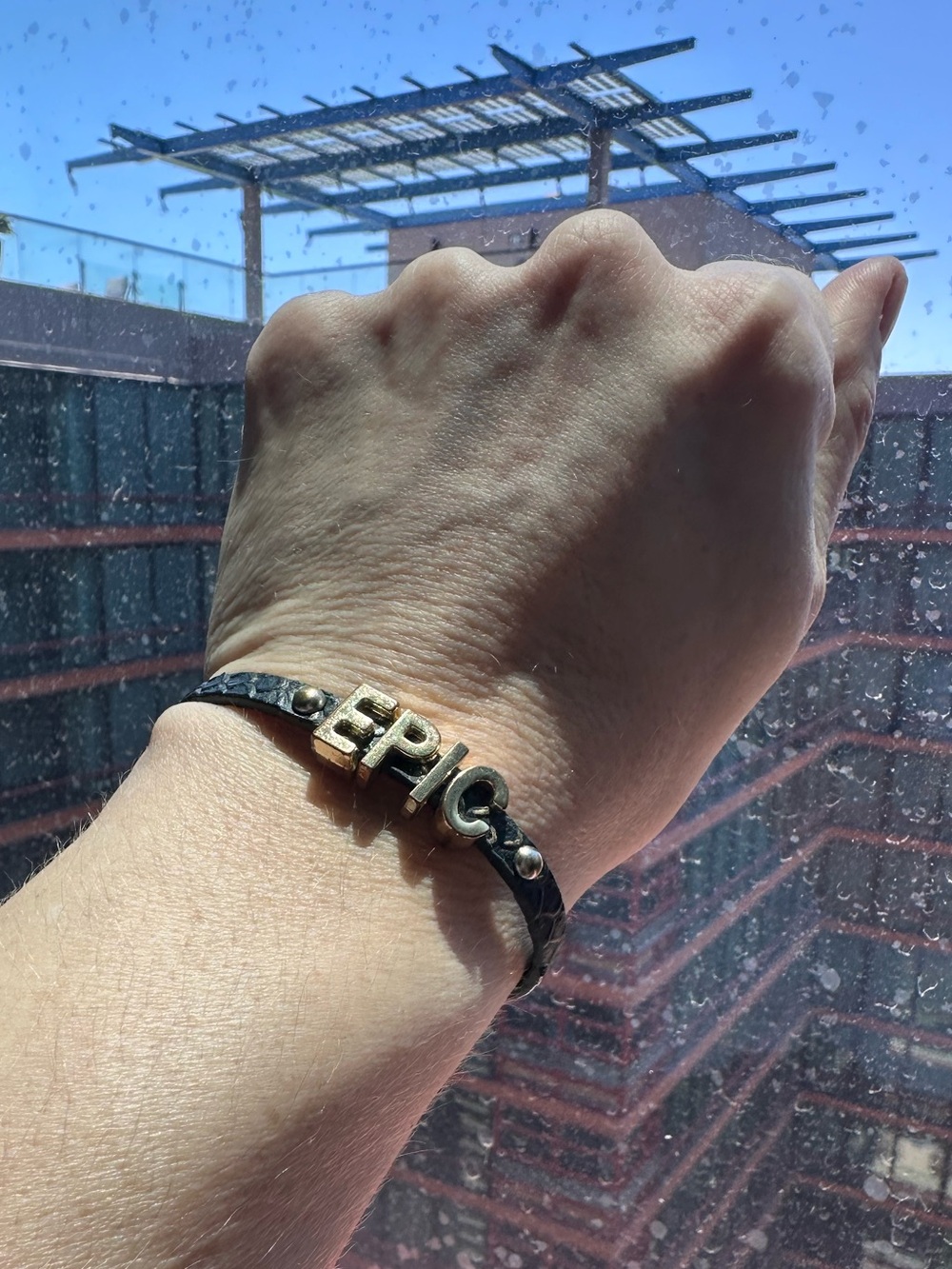 BCBGeneration EPIC Black Leather and Gold Letter Bracelet